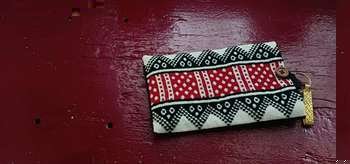 Stylish pouch for phone and money that clips onto a hip belt
