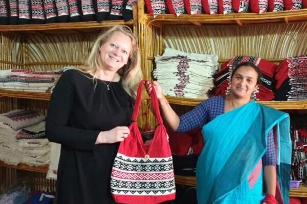Women on Wings textile expert reviewing Heritage embroidery with Shalom Ooty